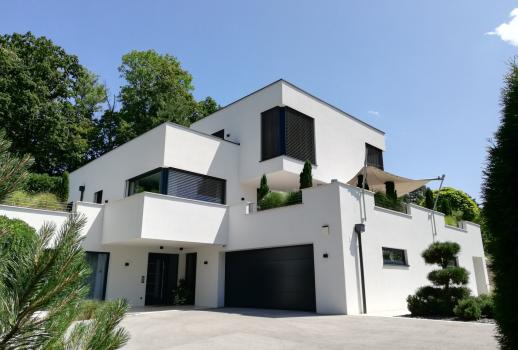 Modern luxury villa with alpine chalet